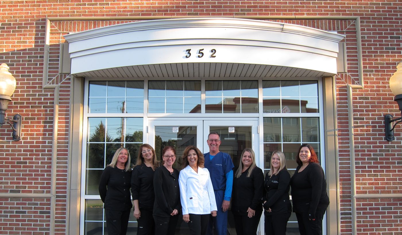 Dr. Maggie A. Kleem and the full dental team outside 352 W. Bagley Rd., Berea, Ohio